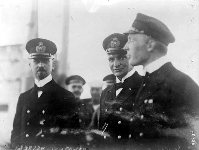 A group of men in uniform standing next to each other.