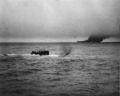 A boat is in the water near an island.