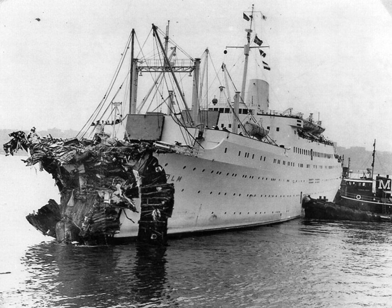 A large white ship is in the water.