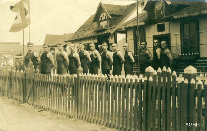 A group of men standing next to each other.