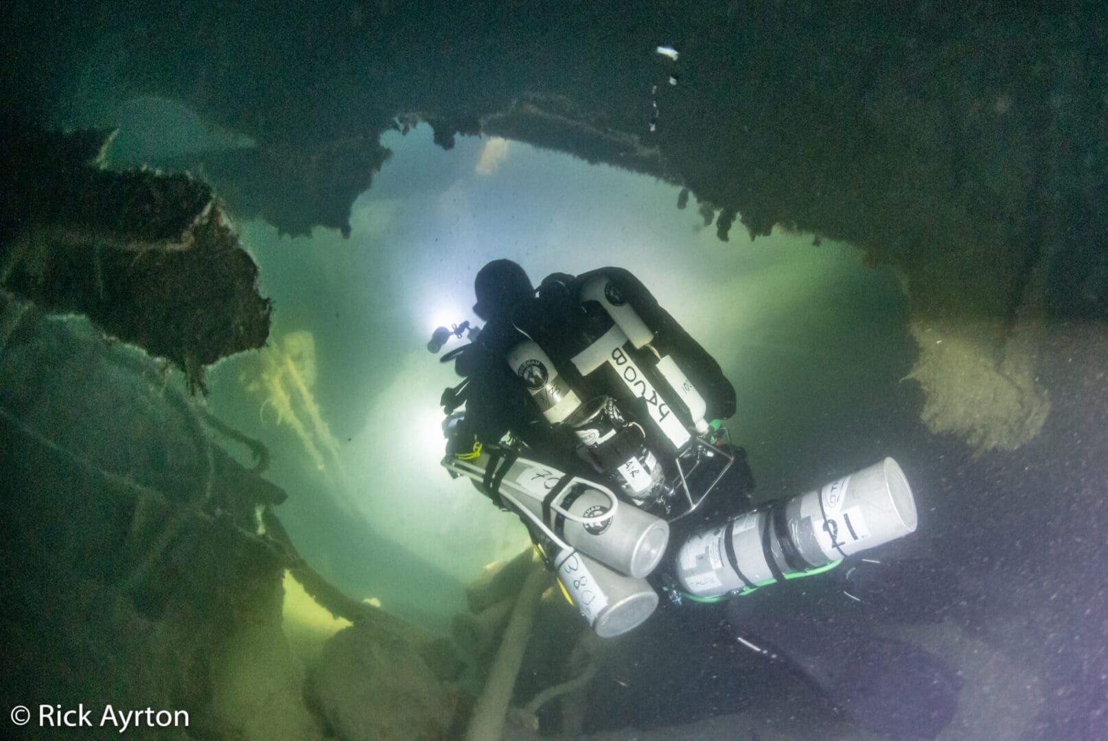 A divers navigates <i>Lusitania’s</i> wreckage.